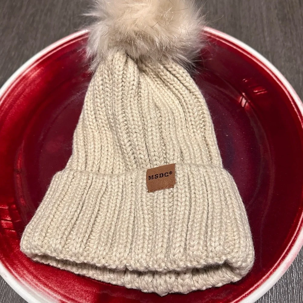 Brand New MSDC Women's Knit Oatmeal Color Beanie featuring a Playful Pom-Pom